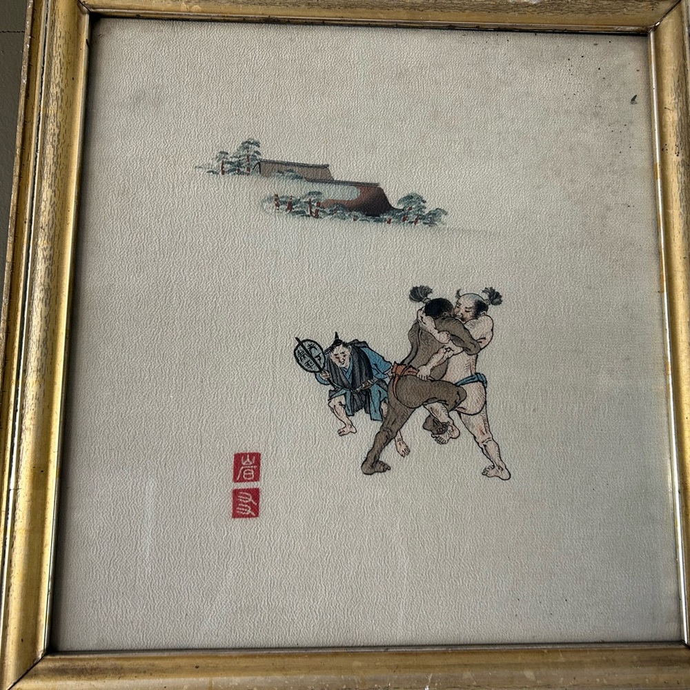 Early 1900’s samurai art on fabric with frame.